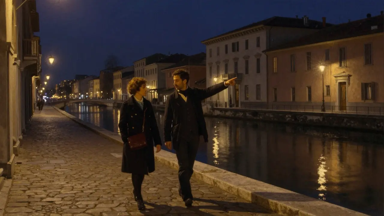 Two people walking peacefully along Milan's Navigli canal at night, lanterns glowing softly on the water.